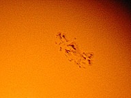 Une jolie tache solaire  la webcam